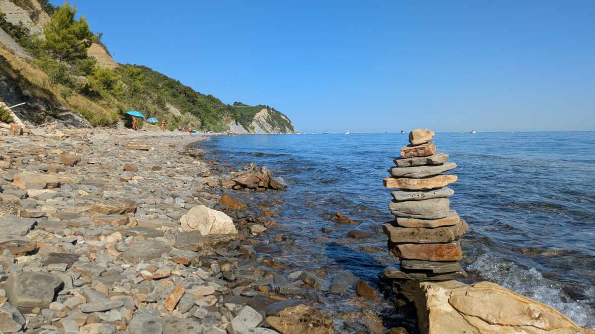 Beach White Cliff - Izola - Slovenia - stone tower on beach
